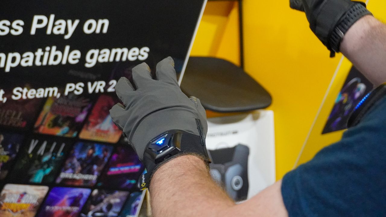 I Tried the Latest Haptic VR Vest and Gloves — and It's More Immersive Than Ever