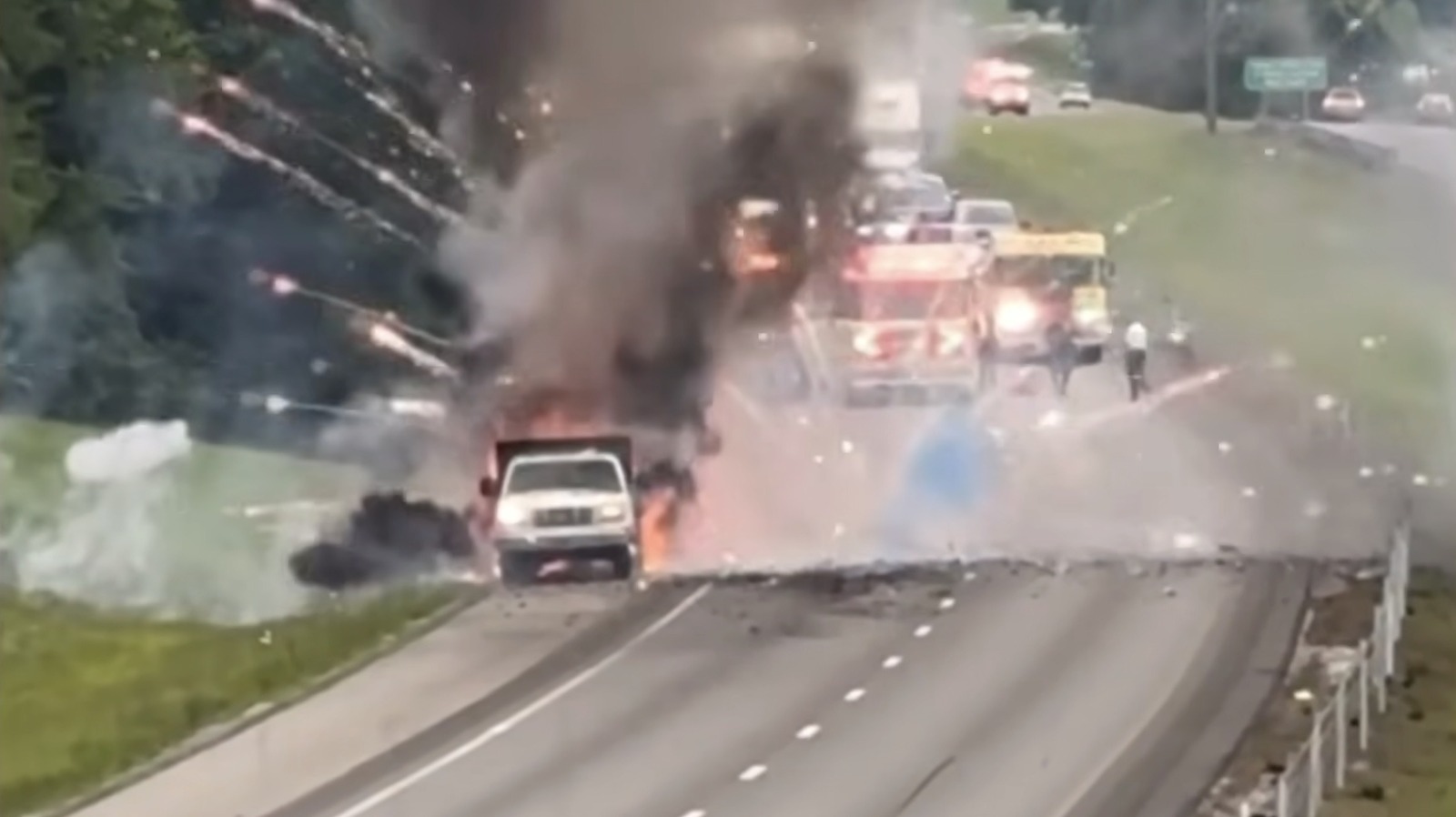 Drivers Treated To Fireworks Show As Trailer Burns on the Highway