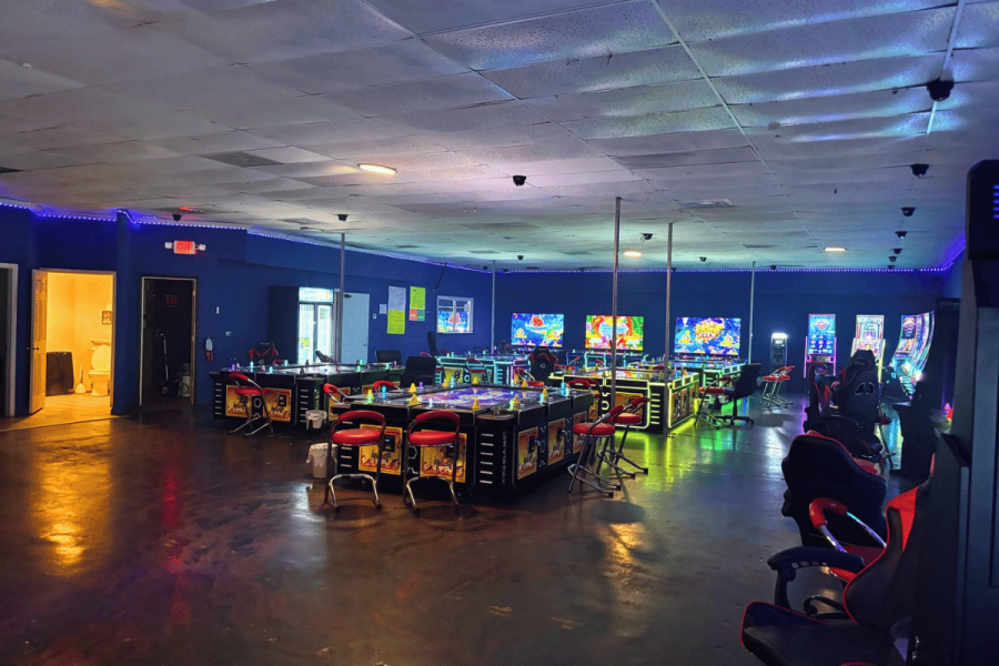 Charlotte Gambling Raid Nets Arrests, Cash, Firearms, and Over 100 Machines