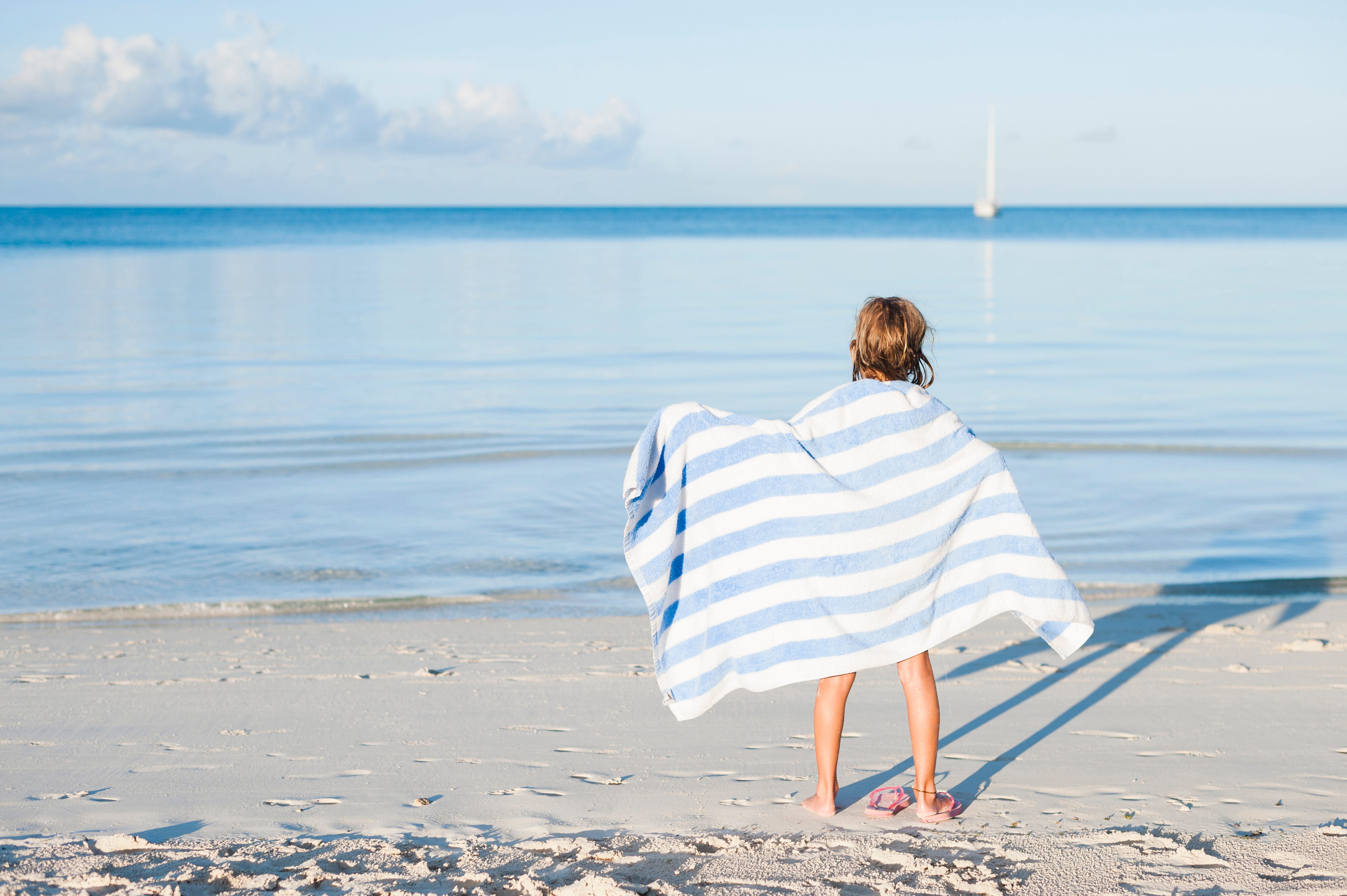 Why You Shouldn't Bring a Bath Towel to the Beach, According to a Textile Expert
